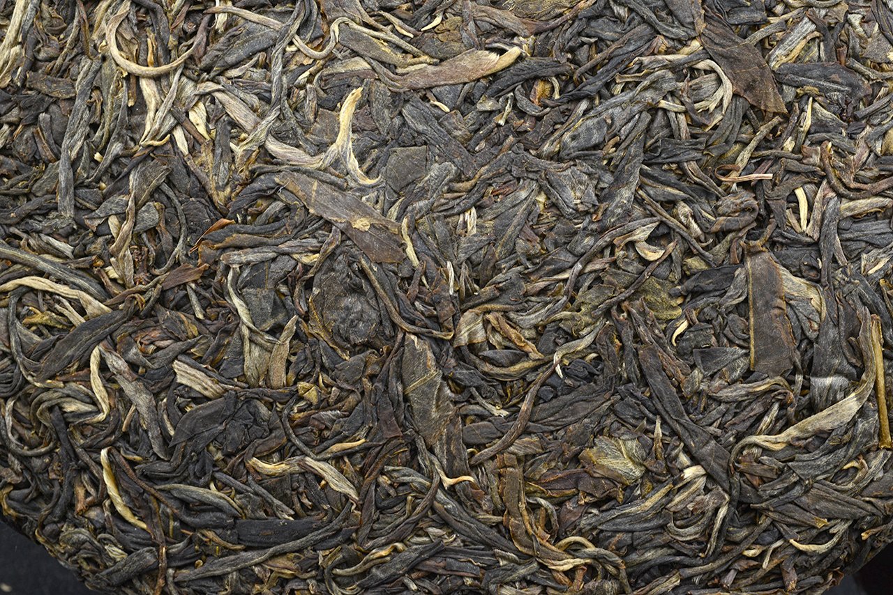2008 Guan Zi Zai Vad Yi Wu hegyi sheng puerh tea