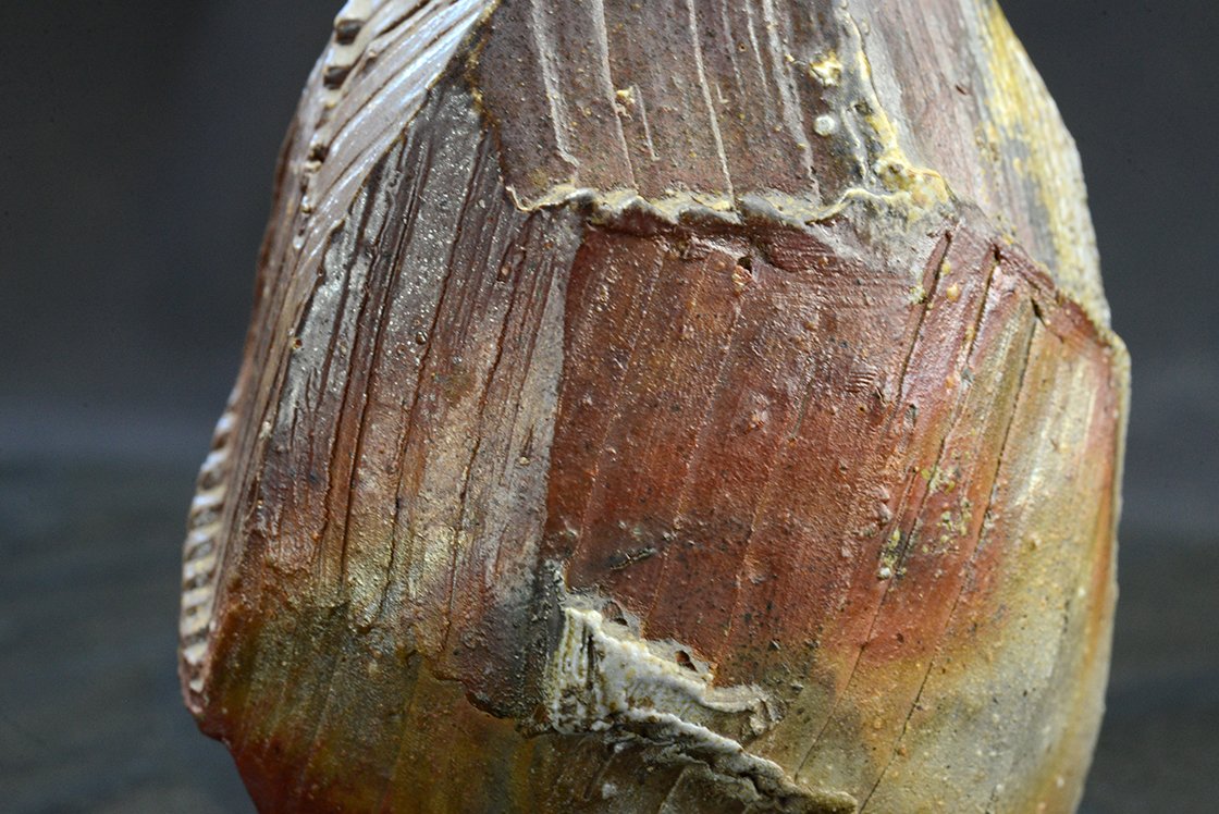 Hisamoto Koichi szaké kiöntő