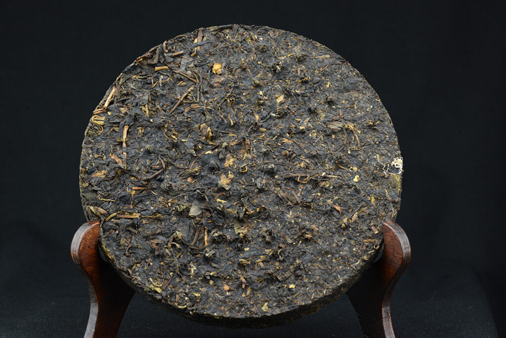 2010 Xiaguan - Ősi, vad teafák lombja sheng puerh tea