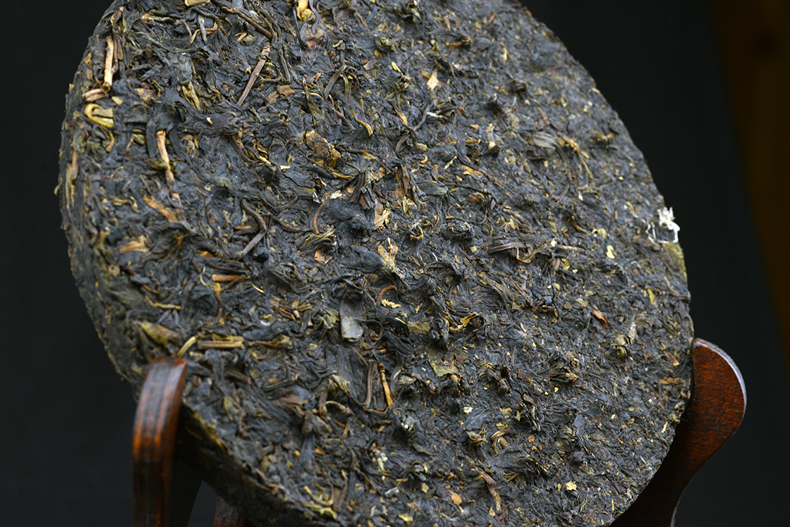 2010 Xiaguan - Ősi, vad teafák lombja sheng puerh tea