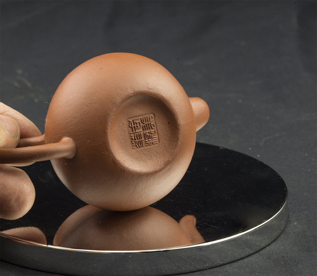 Siting yixing teáskanna